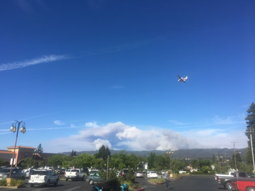 After getting the trailer, looking back toward home with billowing smoke in the way